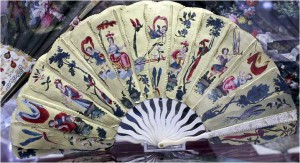 Palmette fan from 1680. The elements of the leaf are made of silk fixed on cardboards and are painted with gold and silver.